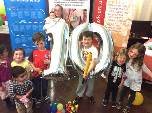 Children celebrating 10 years of the allergy service