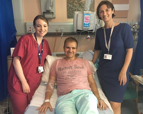 Patient Paul Alexander with PICU staff who saved his life